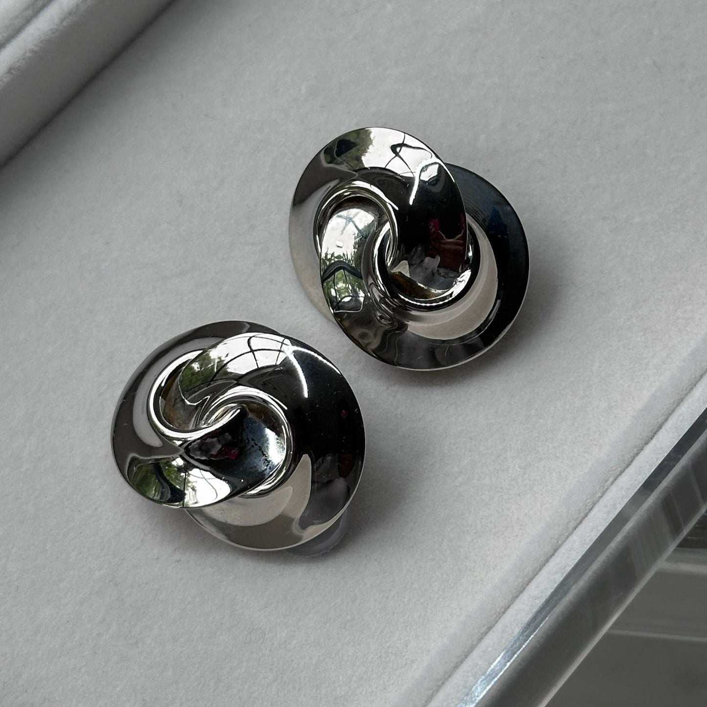 Silver Tone Swirl Clip-On Earrings